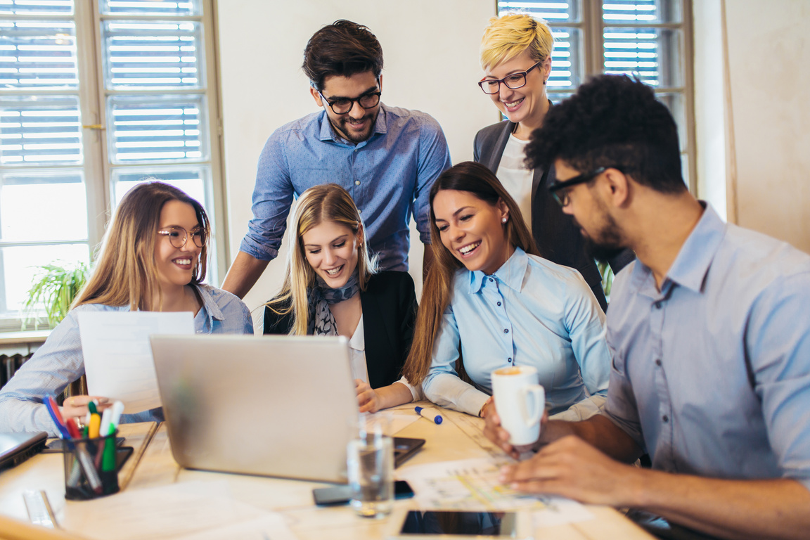 Business people working in office together. Team work in office.